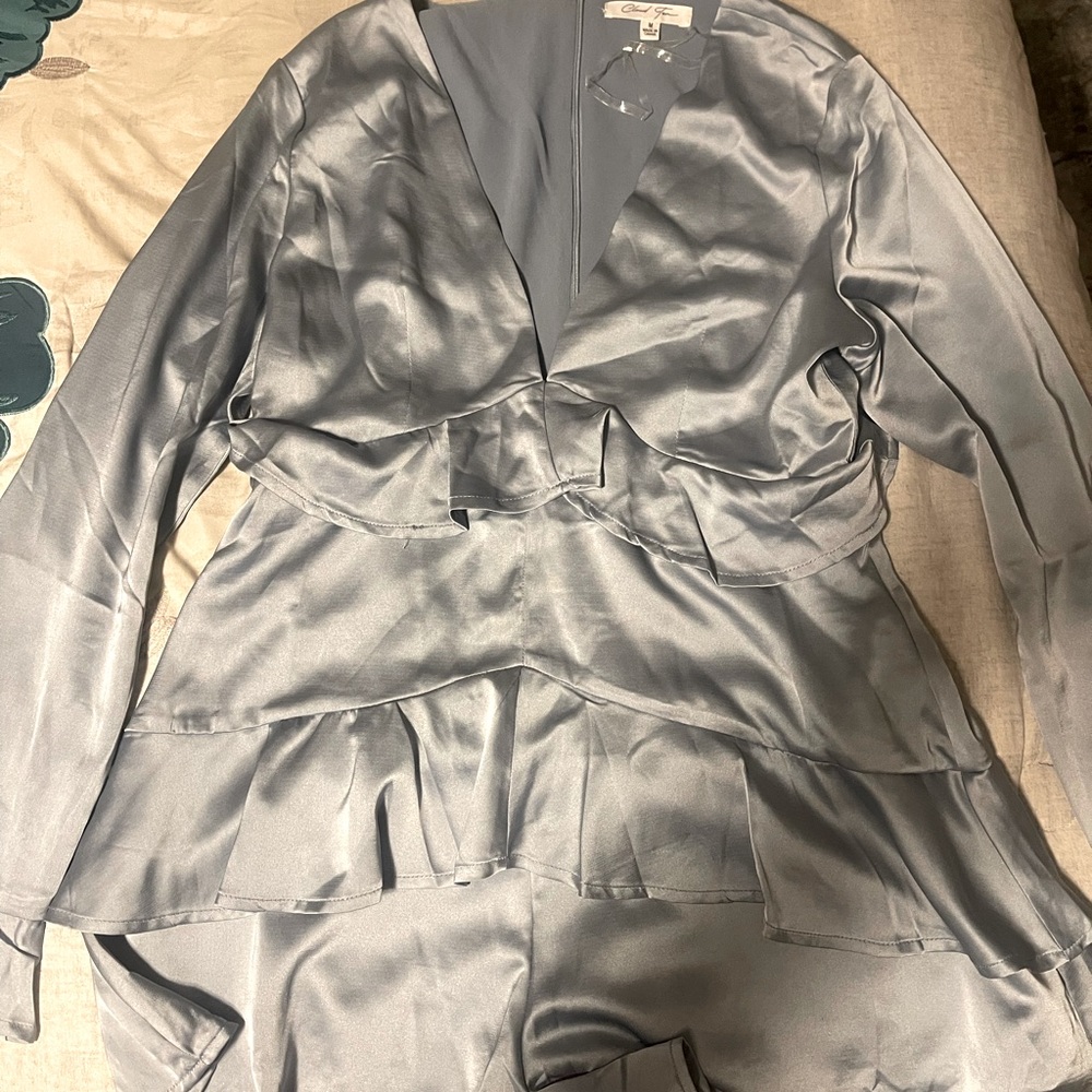 You will fall in love with this Blue Satin Romper